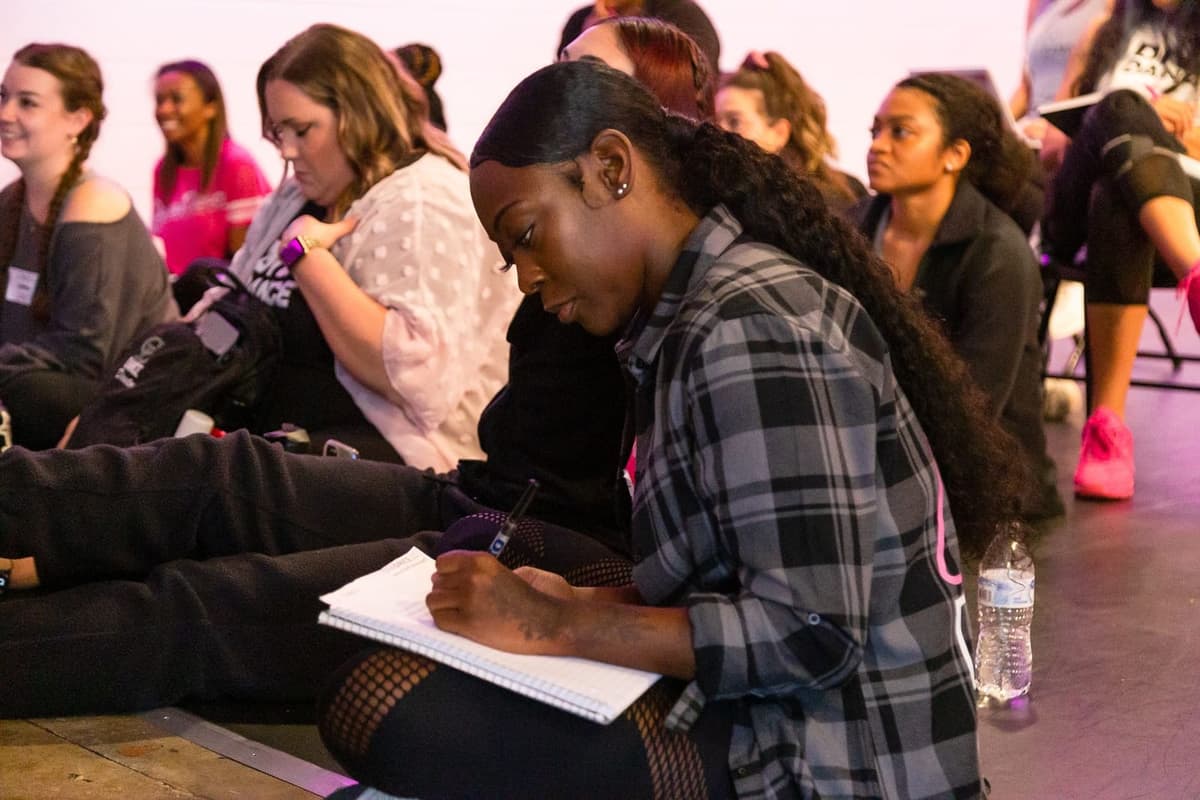 Staff taking notes during training